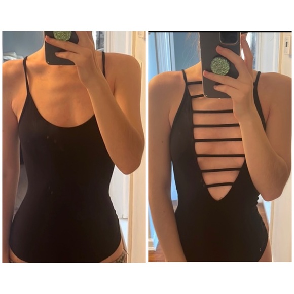 Emma & Sam Tops - NWT LF Emma & Sam Ribbed black reversible bodysuit with ladder cutouts